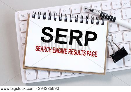 Serp As Search Engine Results Page, Text On White Paper On Computer Keyboard