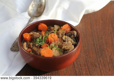 Meat Stew With Vegetable On Rustic Wooden Background
