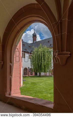 View Through A Window Into The Inner Garden Of The Eberbach Monastery