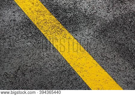Yellow Markings Of The New Highway With Tarmak Road Surface Close Up Asphalt Texture, Nobody.