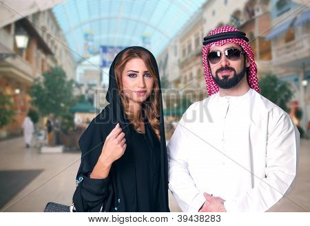 Arabian couple shopping