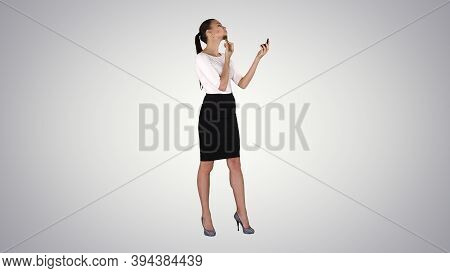 Facial Makeup Young Female Model Putting Blush With Cosmetic Bru