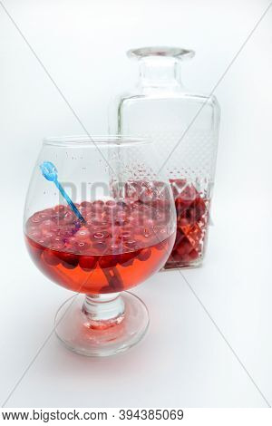 Homemade Tincture Of Red Cherry. Berry Alcoholic Drinks Concept. Homemade Red Wine Made From Ripe Ch