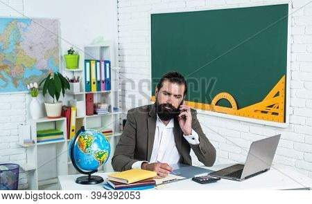 Online Studying. Informal Education. Male Student Sit In School Classroom While Online Lesson. Pass 