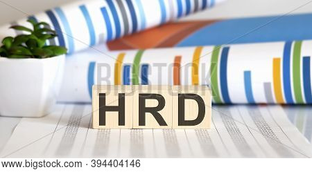 Word Hrd Made With Wood Building Blocks On The Chart Background