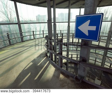 Sign With Arrow On Car Parking In West Amsterdam On Sunny Day Near Highway A10