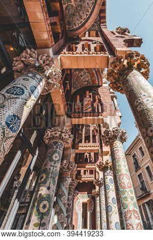 Barcelona, Spain - Feb 24, 2020: Intricate Mosaics Cermic Tiles Columns On Balcony Catalonia Music H