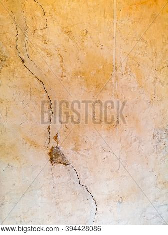 Broken Wall Of Old Building With Crack And Hole
