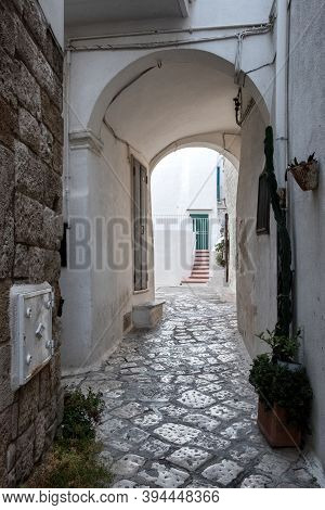 Narrow Street In The Old Town, Passage Through The Arch, Italy.