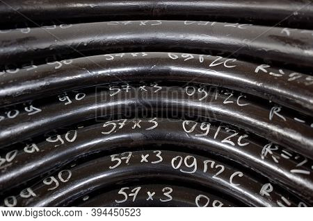 Black Metal Pipes And Adapters Of Different Diameters For Gasification Or Water Supply. Industrial B