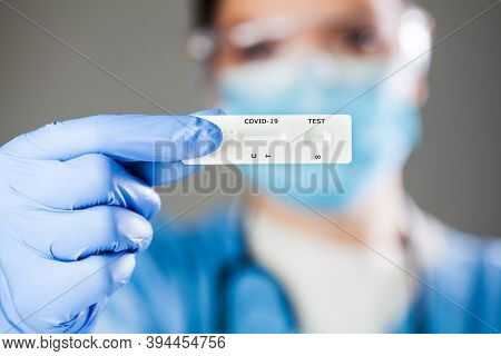 Covid-19 Virus Disease Diagnostic,doctor Holding Coronavirus Test Cassette,rapid Strep (rst) Kit,qui