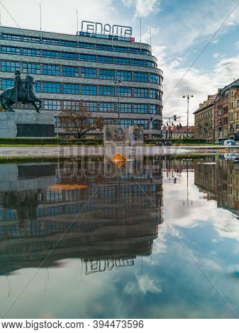 Wroclaw October 10 2019 Renoma Mall Reflected In Puddle