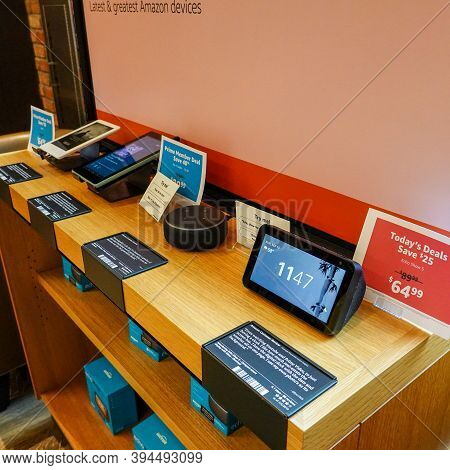 An Amazon Kindle Paperwhite, Fire, Alexa Echo Dot, And Echo Show 5 For Sale An Amazon Bookstore.