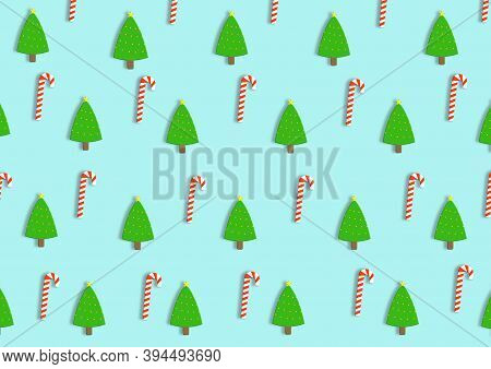 Christmas Trees And Candy Canes Pattern With Drop Shadow On Pastel Mint Coloured Background. (vector
