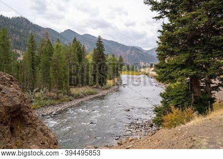 View Of Rock Formations And The Nork Fork Shoshone River Near Cody, Wyoming In Fall