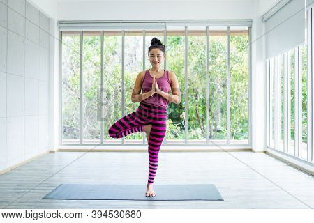 Asian Women Workout Practicing Yoga Training Put On Pink Clothes And Practice Meditation Wellness Li