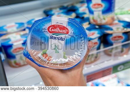 Tyumen, Russia-november 07, 2020: Pack Of Italian Galbani Buratta In The Buyer Hand