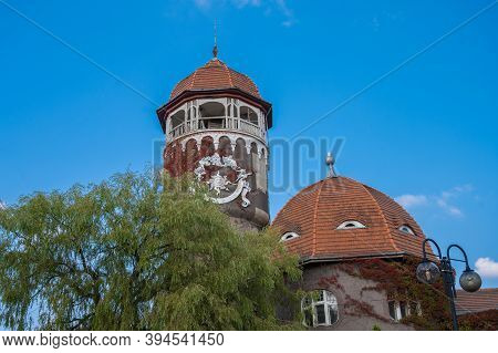 Water Old Tower Of Svetlogorsk, Kaliningrad Region, Russia Against A Blue Sky