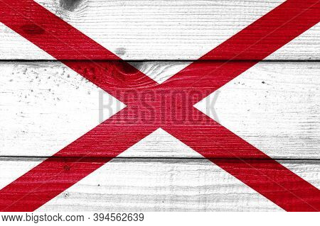 Alabama Flag Painted On Old Wood Plank Background. Brushed Natural Light Knotted Wooden Board Textur