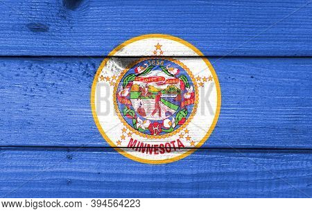 Minnesota Flag Painted On Old Wood Plank Background. Brushed Natural Light Knotted Wooden Board Text