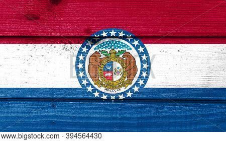 Missouri Flag Painted On Old Wood Plank Background. Brushed Natural Light Knotted Wooden Board Textu