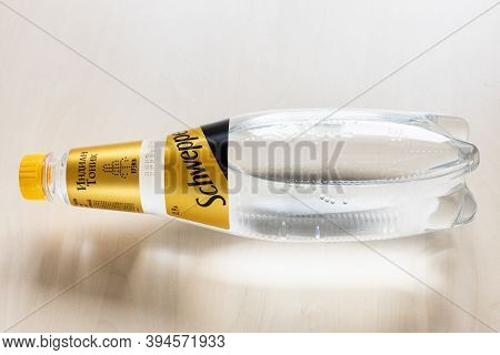 Moscow, Russia - November 4, 2020: Lying Russian Edition Plastic Bottle Of Schweppes Indian Tonic Wa