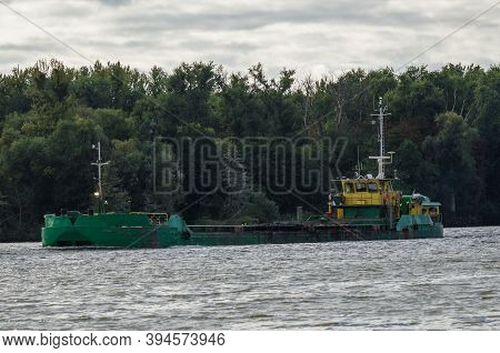 Scow On The Waterway - A Barge On A Canal Cruise
