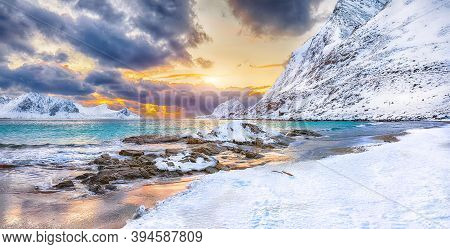 Fantastic Winter View Of Haukland Beach During Sunset With Lots Of Snow  And Snowy  Mountain Peaks N