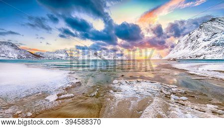 Fabulous Winter Scenery With Haukland Beach During Sunset And Snowy  Mountain Peaks Near Leknes.  Lo