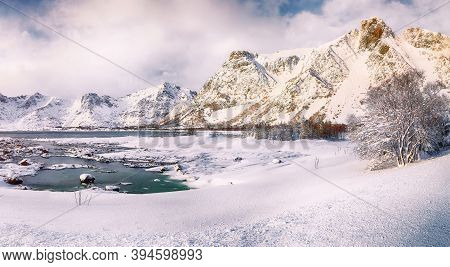 Winter Scenery With Frozen Fjord On Vestvagoy Island With Snowy  Mountain Peaks Near Valberg .  Loca