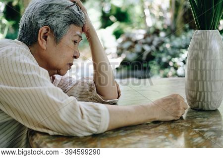 Stressed Depressed Fatigued Sad Upset Asian Old Asian Elderly Senior Elder Woman