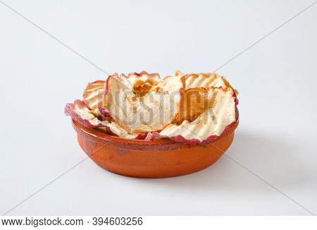 Bowl of dried apple slices - apple chips or rings