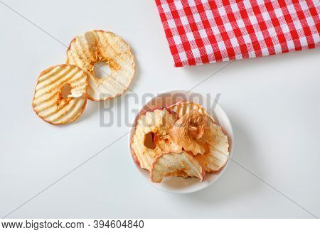 Bowl of dried apple slices - apple chips or rings