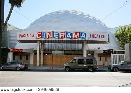 Hollywood, California / USA - November 10, 2020: Pacific's CINERAMA theater. Movie Theater in Hollywood California. Boarded up with Plywood due to Coronavirus and Potential Looting and Rioting. 