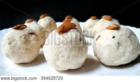 Tasty Rice Laddus In White Plate Garnished With Dry Fruits In India