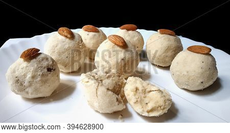Tasty Rice Laddus In White Plate Garnished With Dry Fruits In India