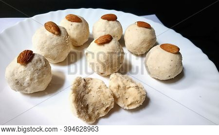 Tasty Rice Laddus In White Plate Garnished With Dry Fruits In India