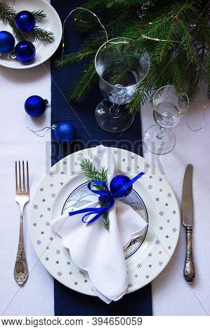 Christmas Or New Year Table Decoration In White And Blue Colors.