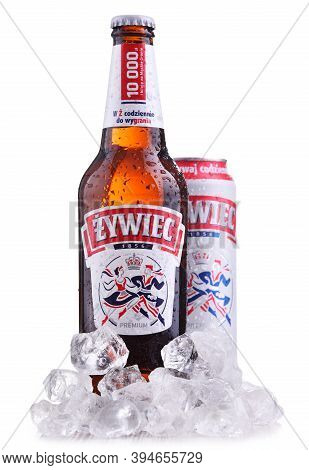 Bottle And Can Of Zywiec Beer Isolated On White