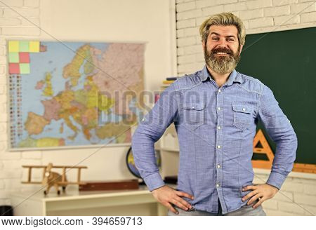 School Subject. History And Geography. Science Concept. Mature Bearded Teacher In Classroom. Private