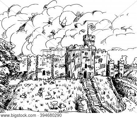 Towers And Stone Walls With Merlons In A Castle On The Top Of A Hill. In The Countryside Of Wales, U