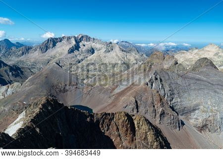 Views Of The Peak And Mountain Lake Of Tebarray With The Balaitus In The Background In The Spanish P