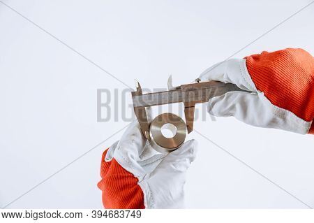 Measuring Inner Diameter, Outer Diameter, Length With A Caliper On A White Background.
