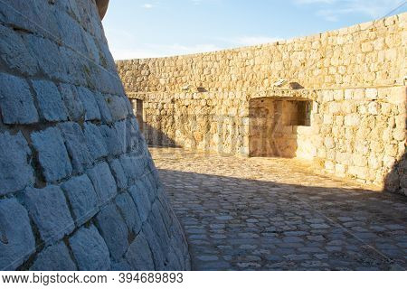 Looping Circle Area Surrounded By Walls Around The Minceta Castle Tower In The Old City Of Dubrovnik