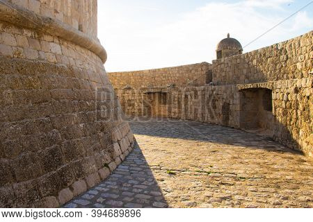 Looping Circle Area Surrounded By Walls Around The Minceta Castle Tower In The Old City Of Dubrovnik