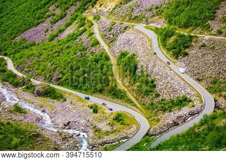 Trolls Path Trollstigen Winding Scenic Mountain Road With Cars, Norway Europe. National Tourist Rout