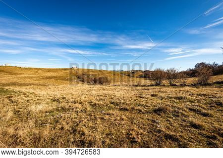 Lessinia Plateau (altopiano Della Lessinia) Near The Peak Of Corno D'aquilio In Autumn With Brown Me