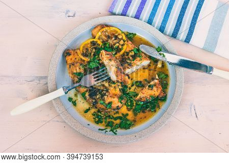 Chicken Francese - Fried Chicken Breast With Lemon Slices And Delicious Sauce On A White Plate On Th