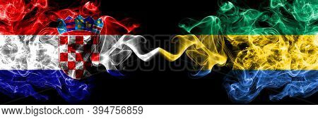 Croatia, Croatian Vs Gabon, Gabonese, Gabonian Smoky Mystic Flags Placed Side By Side. Thick Colored