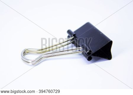School Stationary, Black Paper Clip Isolated On White Background,